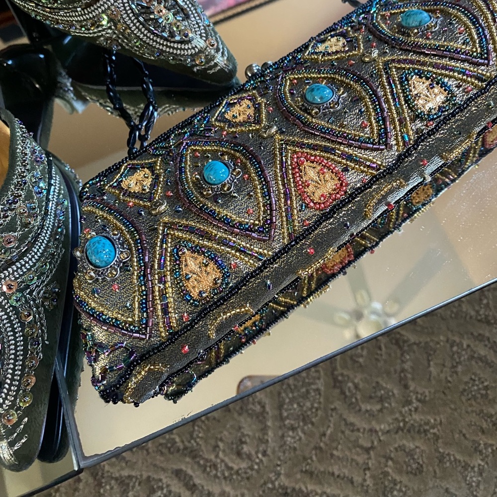 Jeweled shoes in excellent condition and CEM handbag is brand new.